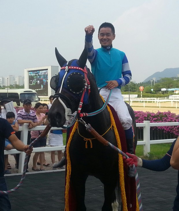 Joe Fujii and Magic Dancer in the Jeju Governor's Cup winner's circle