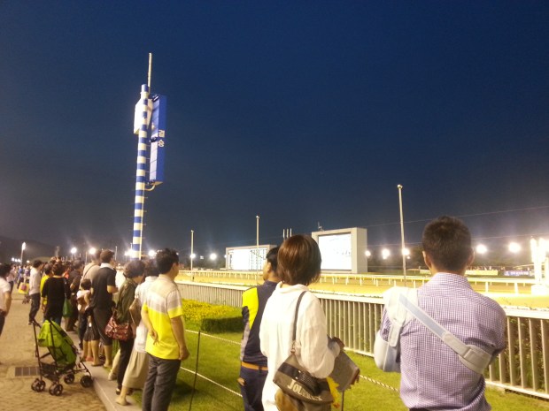 An injured Joe Fujii watches the races at Seoul 